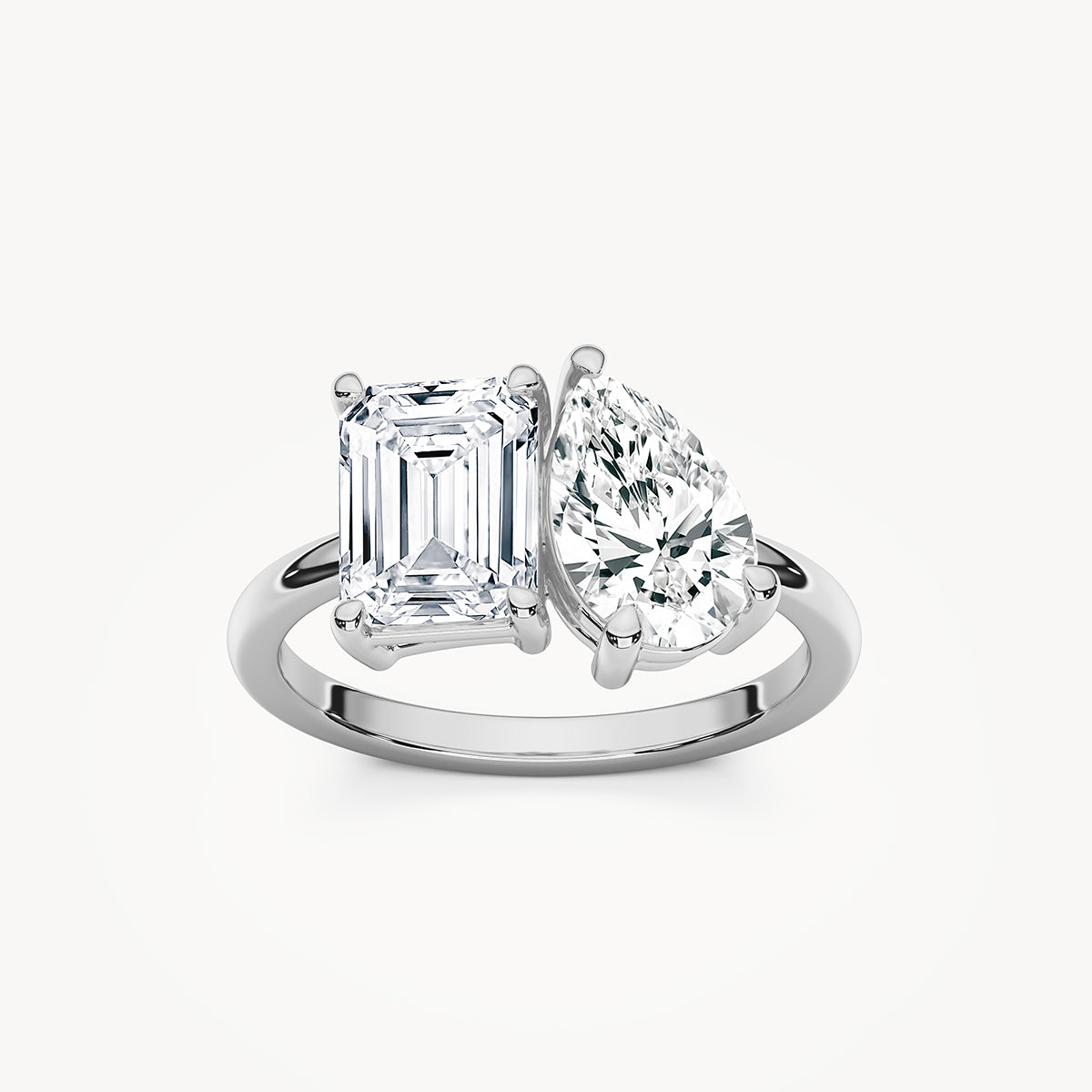 Fleur 2 ½ ctw Emerald and Pear Lab Grown Diamond Toi et Moi Engagement Ring