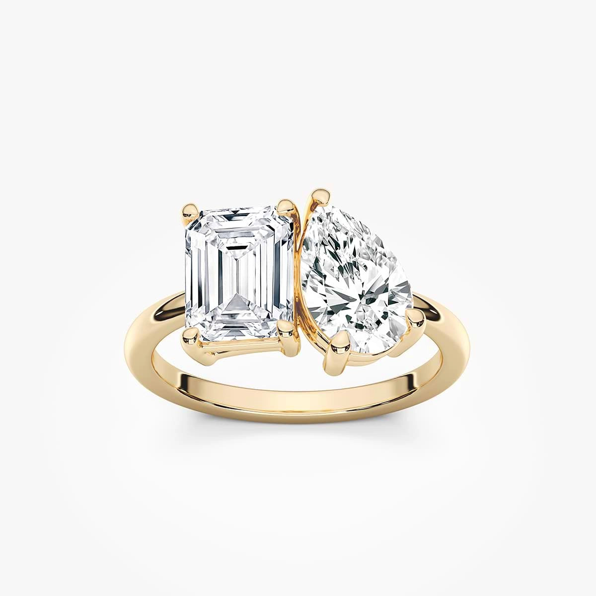 Fleur 2 ½ ctw Emerald and Pear Lab Grown Diamond Toi et Moi Engagement Ring in yellow finish